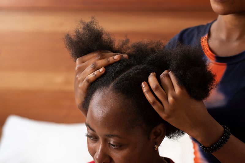 Trichologist performing scalp treatment in Windhoek